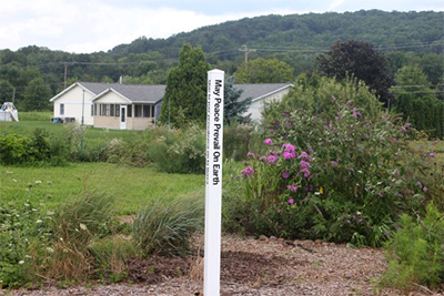 Peace-Pole-Ceremony-at-GODS-ACRE-Organic-Community-Garden-Bally,-Pennsylvania-USA
